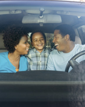 family inside a car