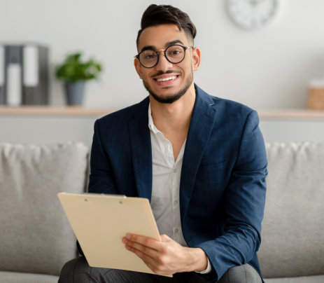 man sitting on the sofa smiling